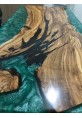Maize Coastline Dining Table Surrounded by Turquoise Waters